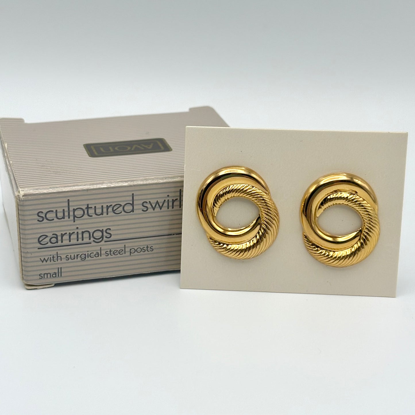 1991 Avon Sculptured Swirl Earrings