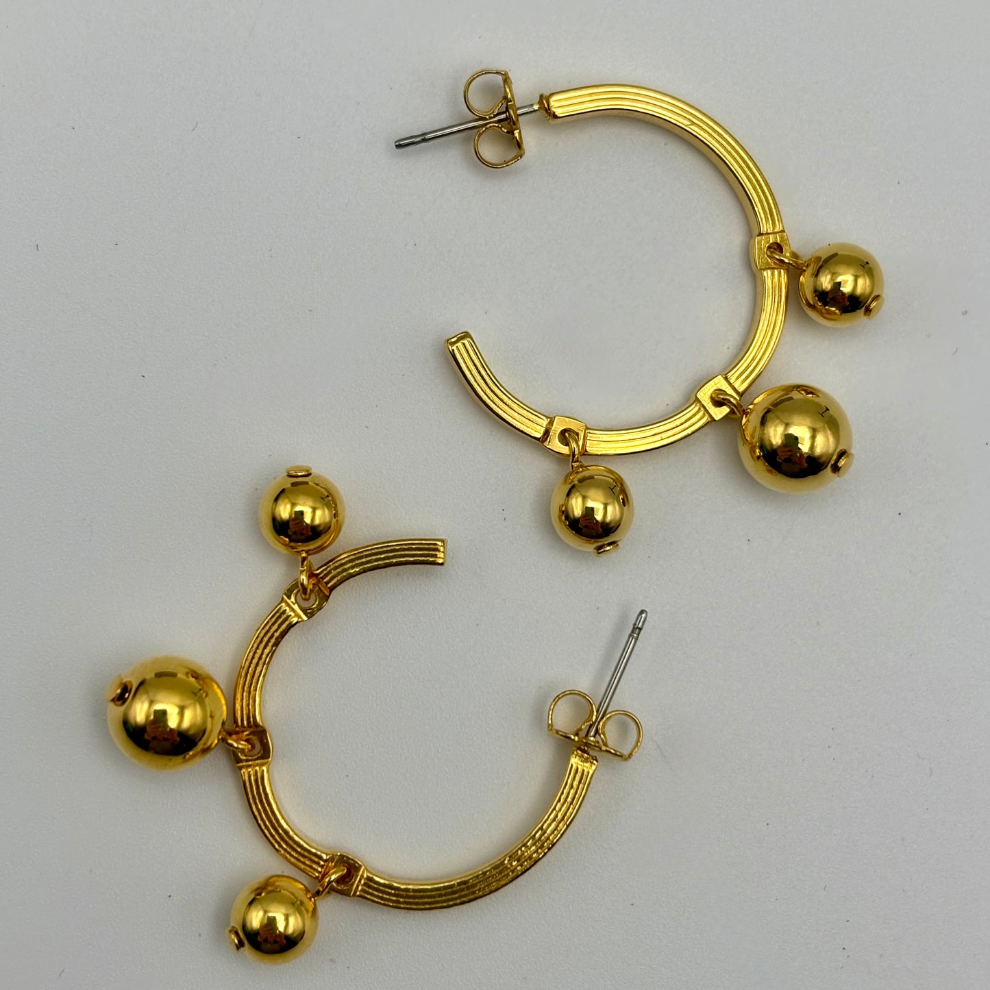 1991 Avon Hoops of Motion Earrings