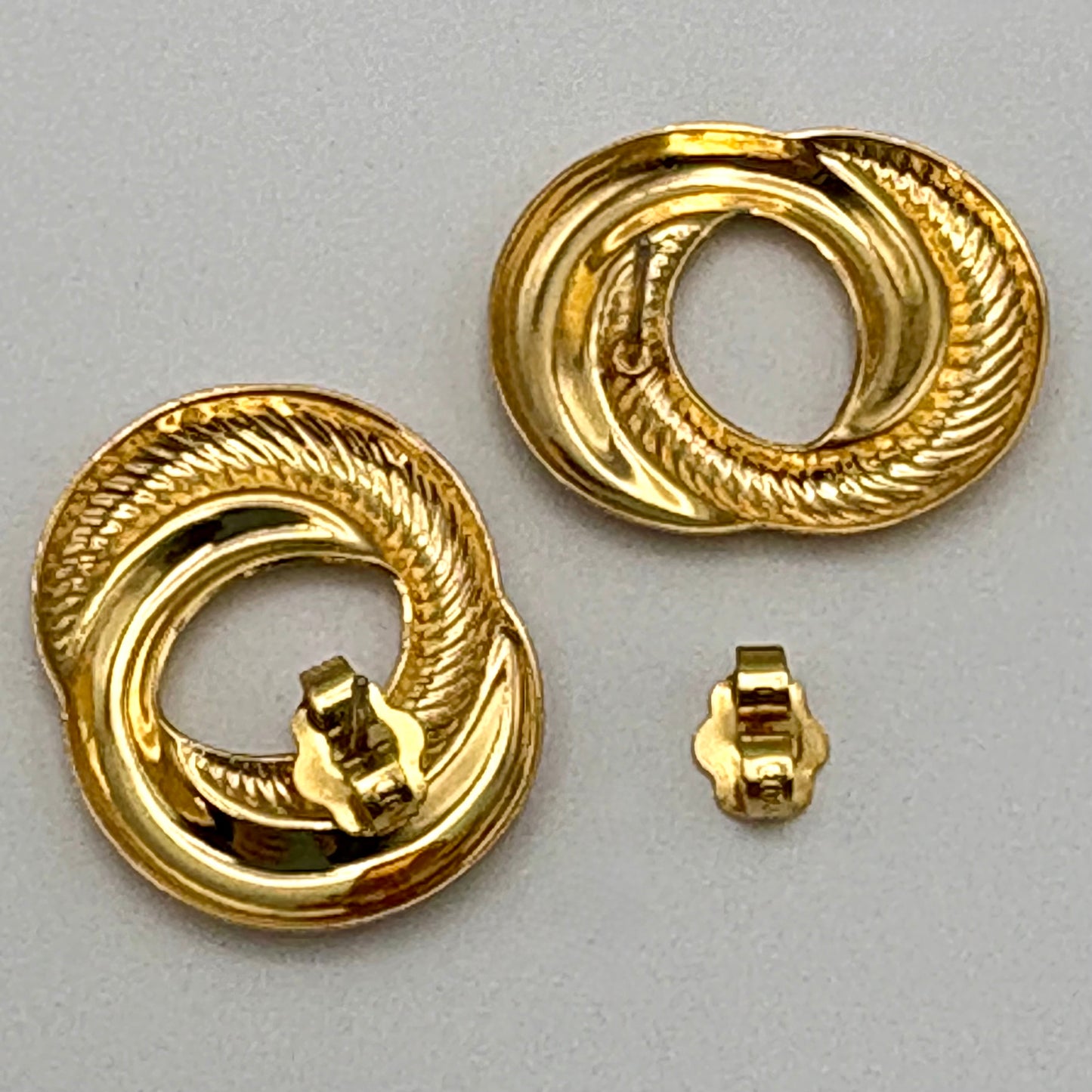 1991 Avon Sculptured Swirl Earrings