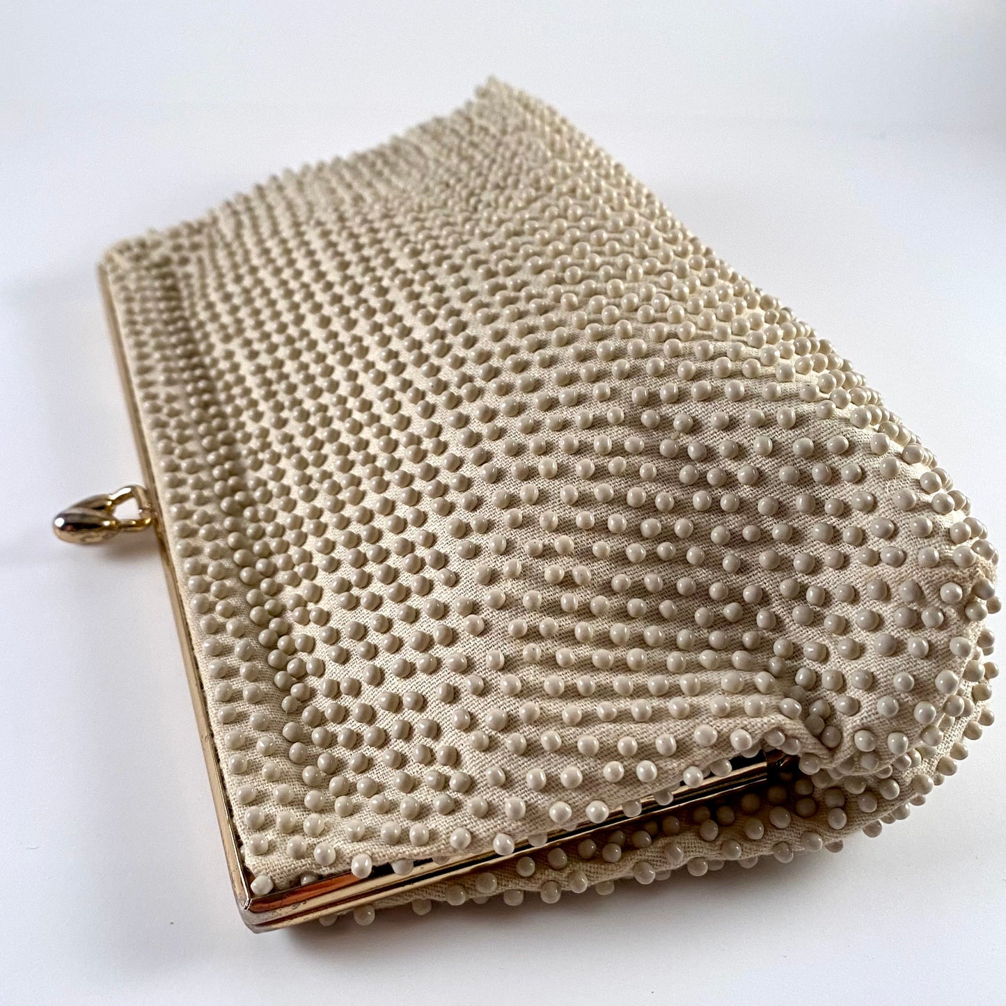 Late 50s/ Early 60s Lumured Ivory Beaded Clutch