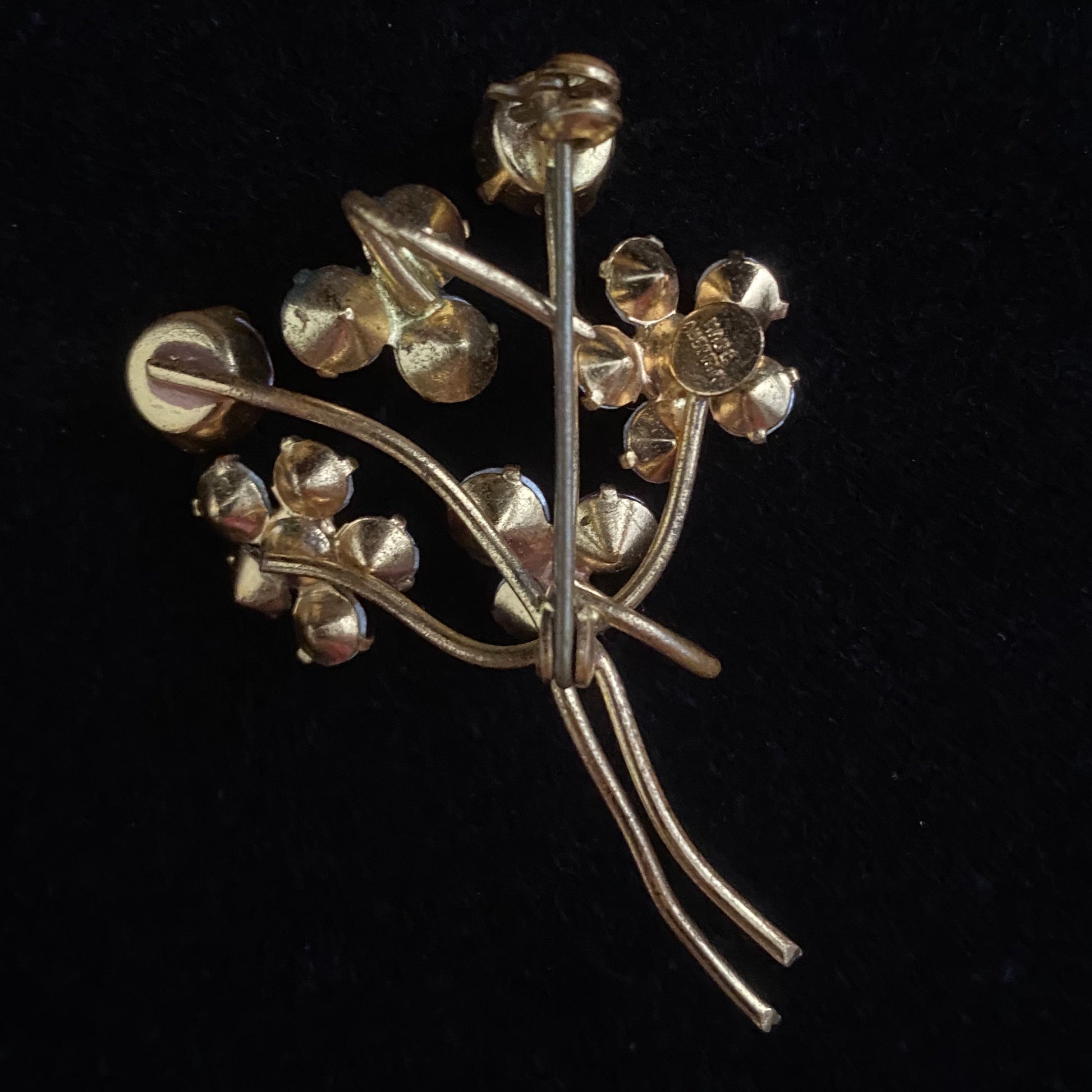 1950s vintage rhinestone pins, a bouquet of flowers, vintage rhinestone pin