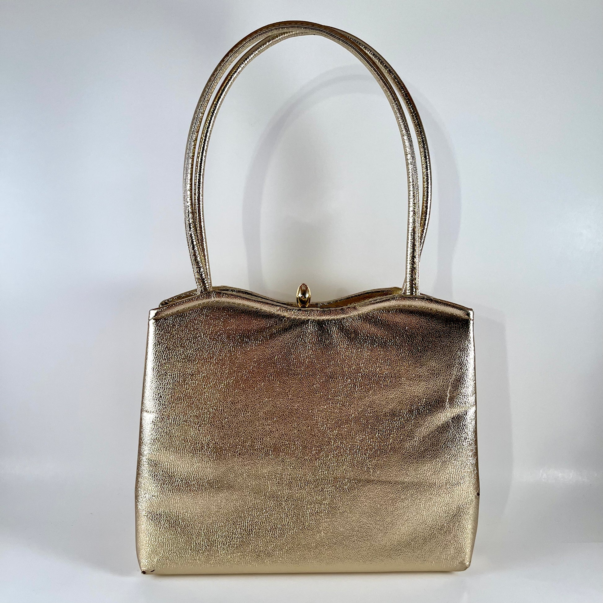 Antique gold handbag 2025