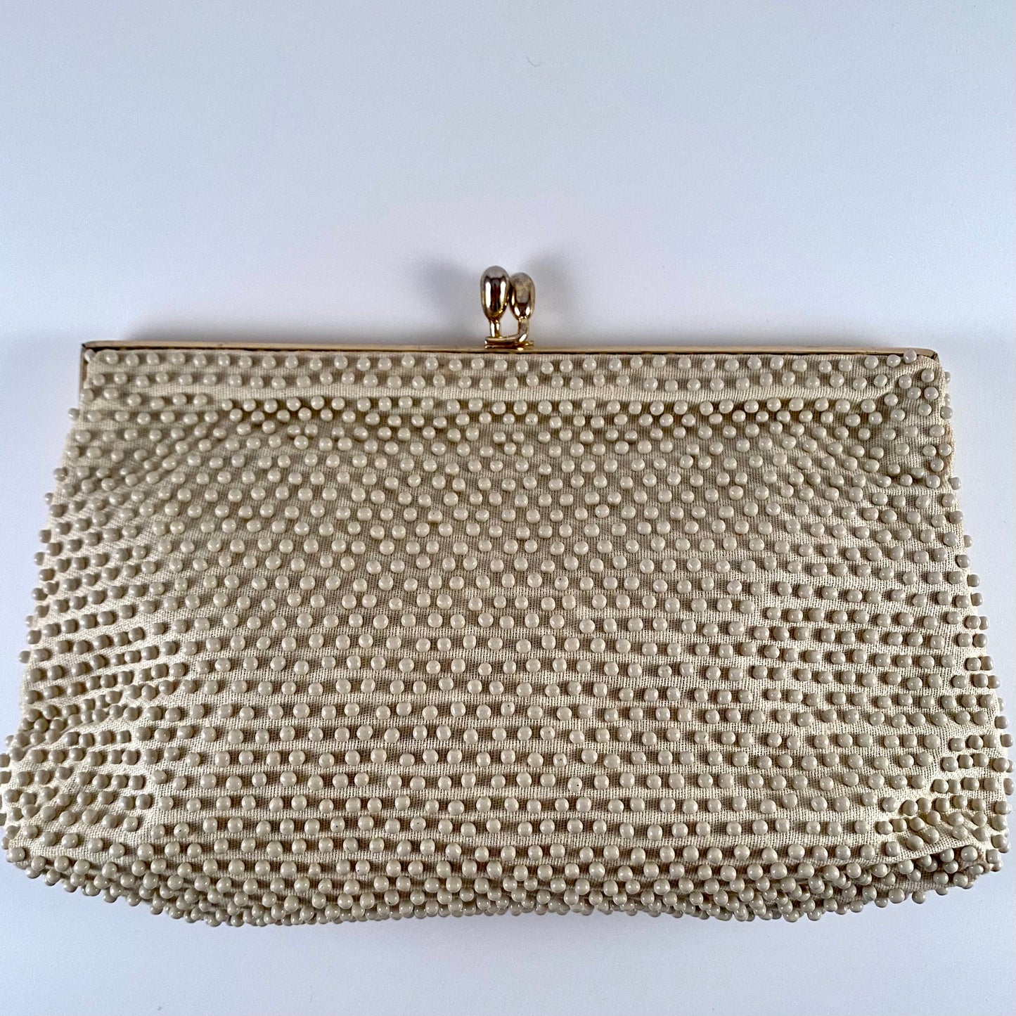 Late 50s/ Early 60s Lumured Ivory Beaded Clutch