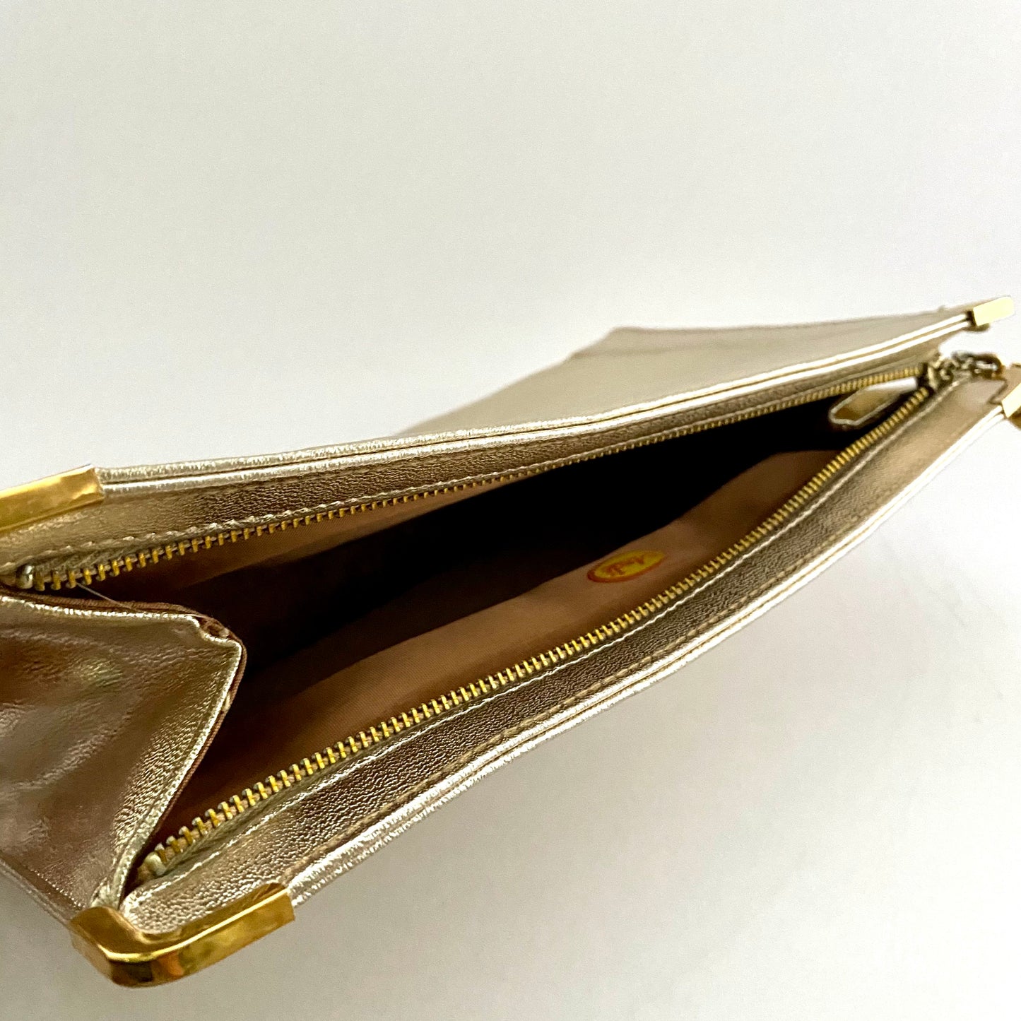 1960s Andé Metallic Pale Gold Wristlet Clutch – Retro Kandy Vintage