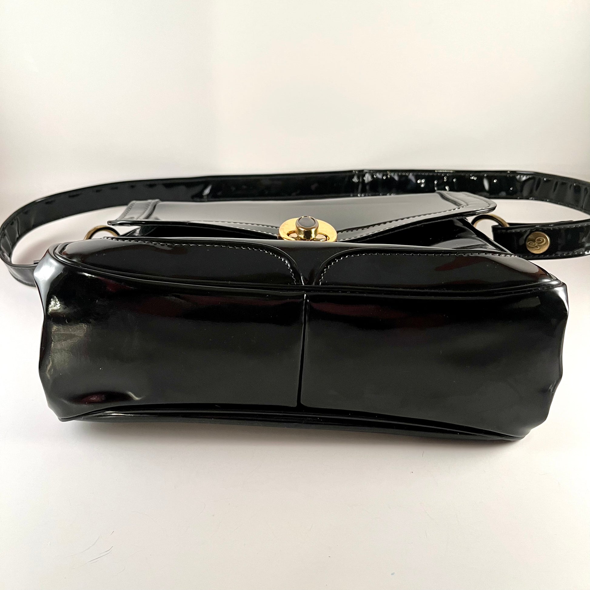A 1960s Vintage Gucci Black Patent Leather Handbag with Gold Hardware