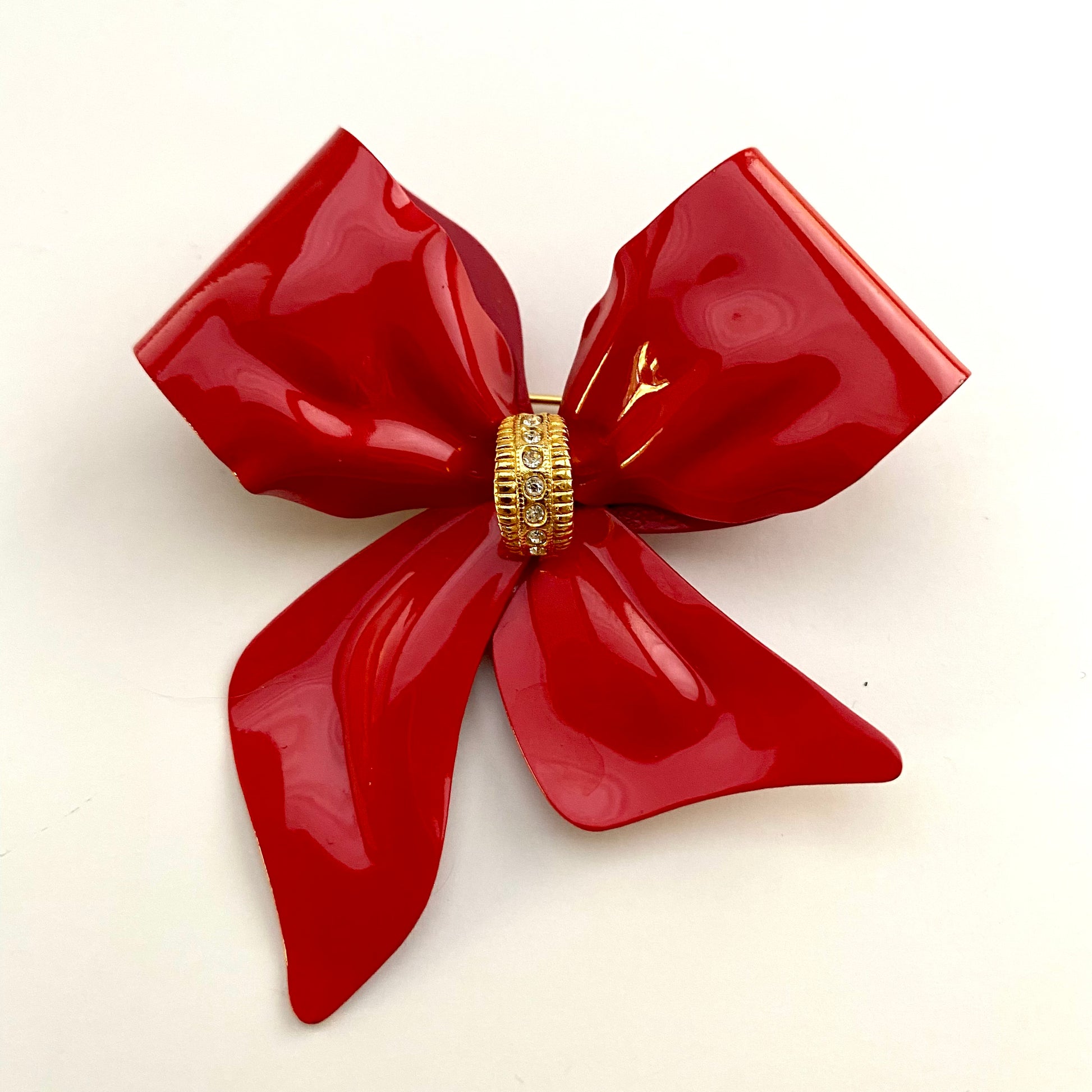 Enamel bow brooch - .de