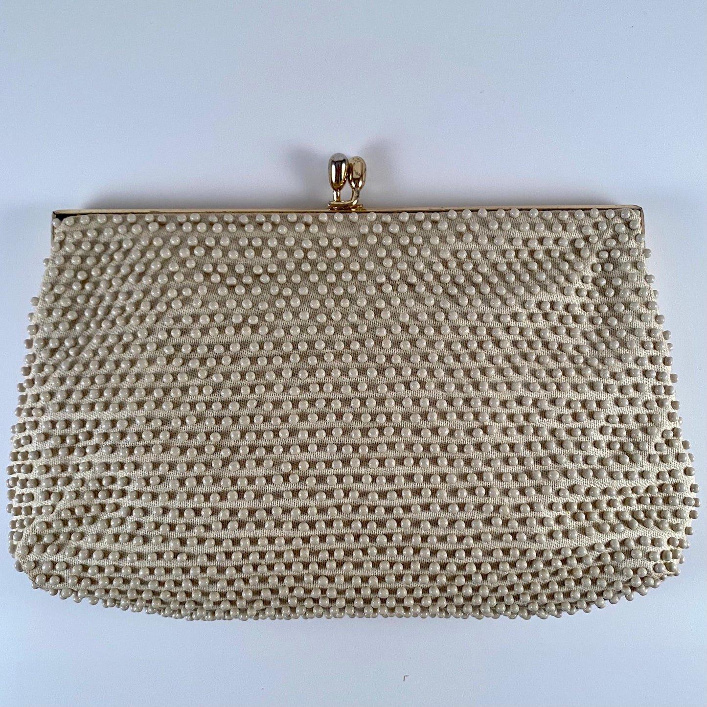 Late 50s/ Early 60s Lumured Ivory Beaded Clutch