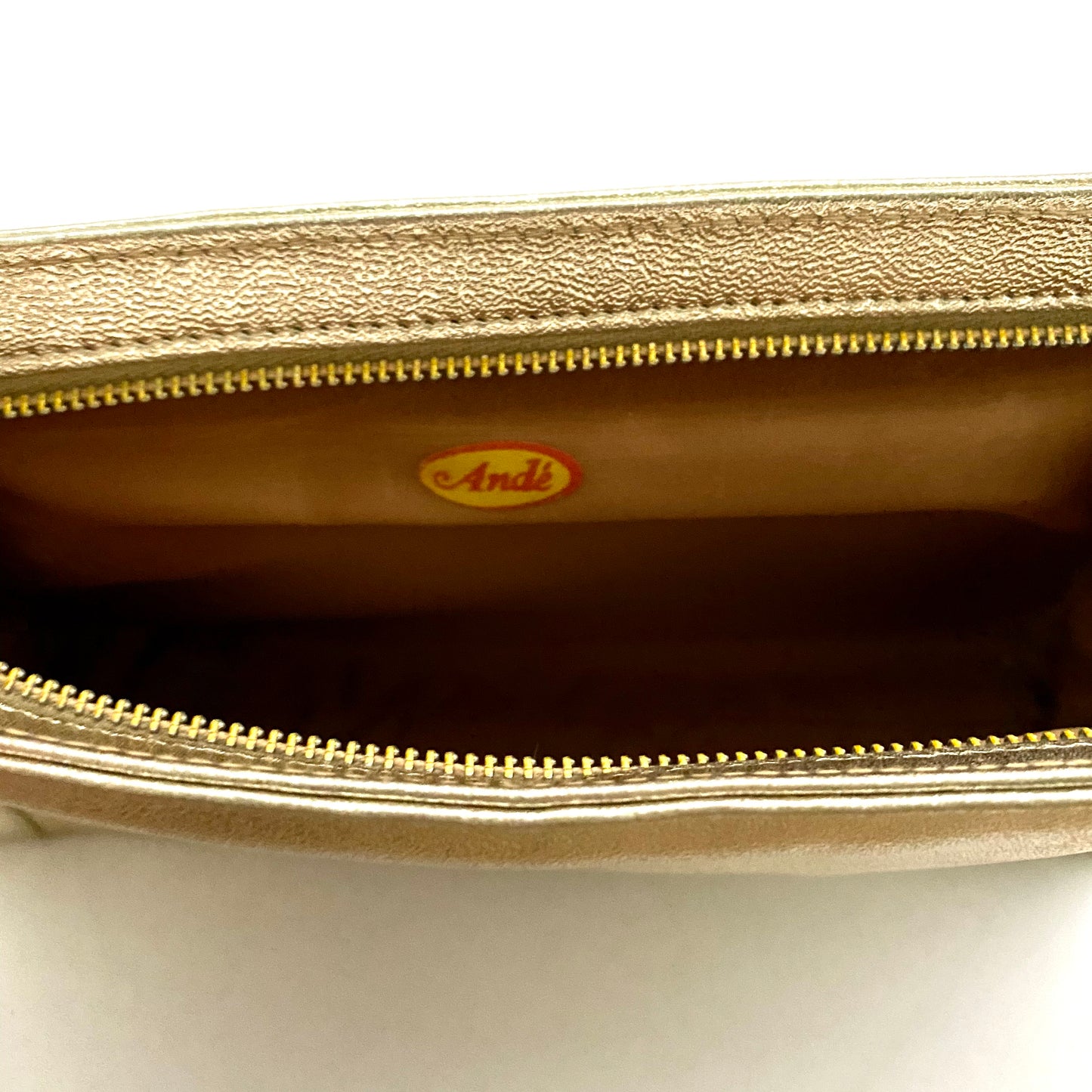 1960s Andé Metallic Pale Gold Wristlet Clutch
